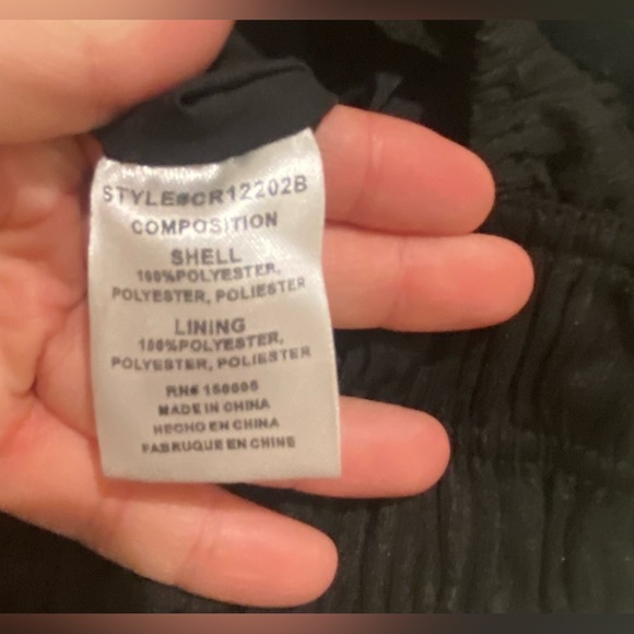 Black NSR Smocked Ruffle Trim Jumpsuit - Picture 10 of 11